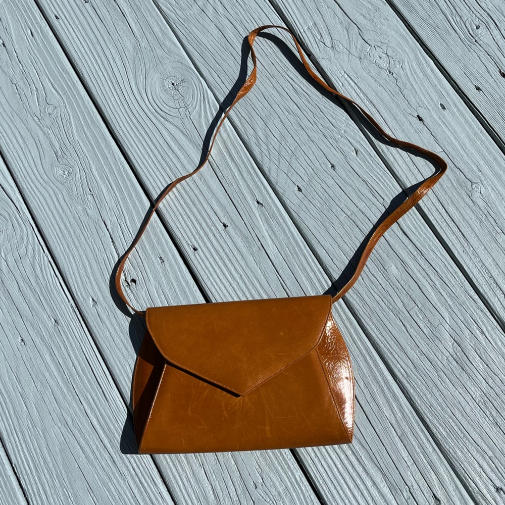 Allure faux leather crossbody clutch